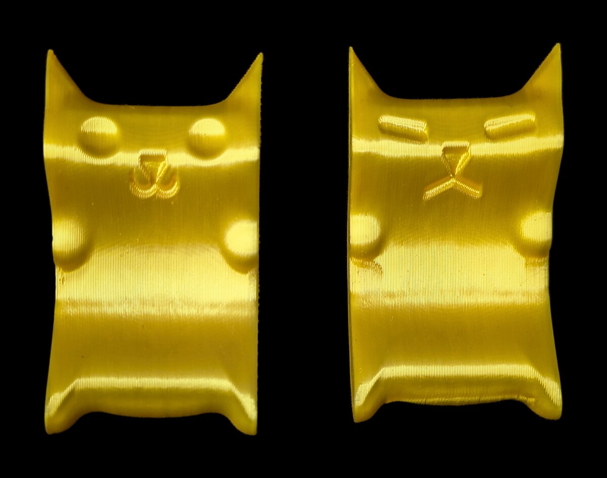 Cat Worry Stone — two gold printed pocket cats, one happy and one grumpy